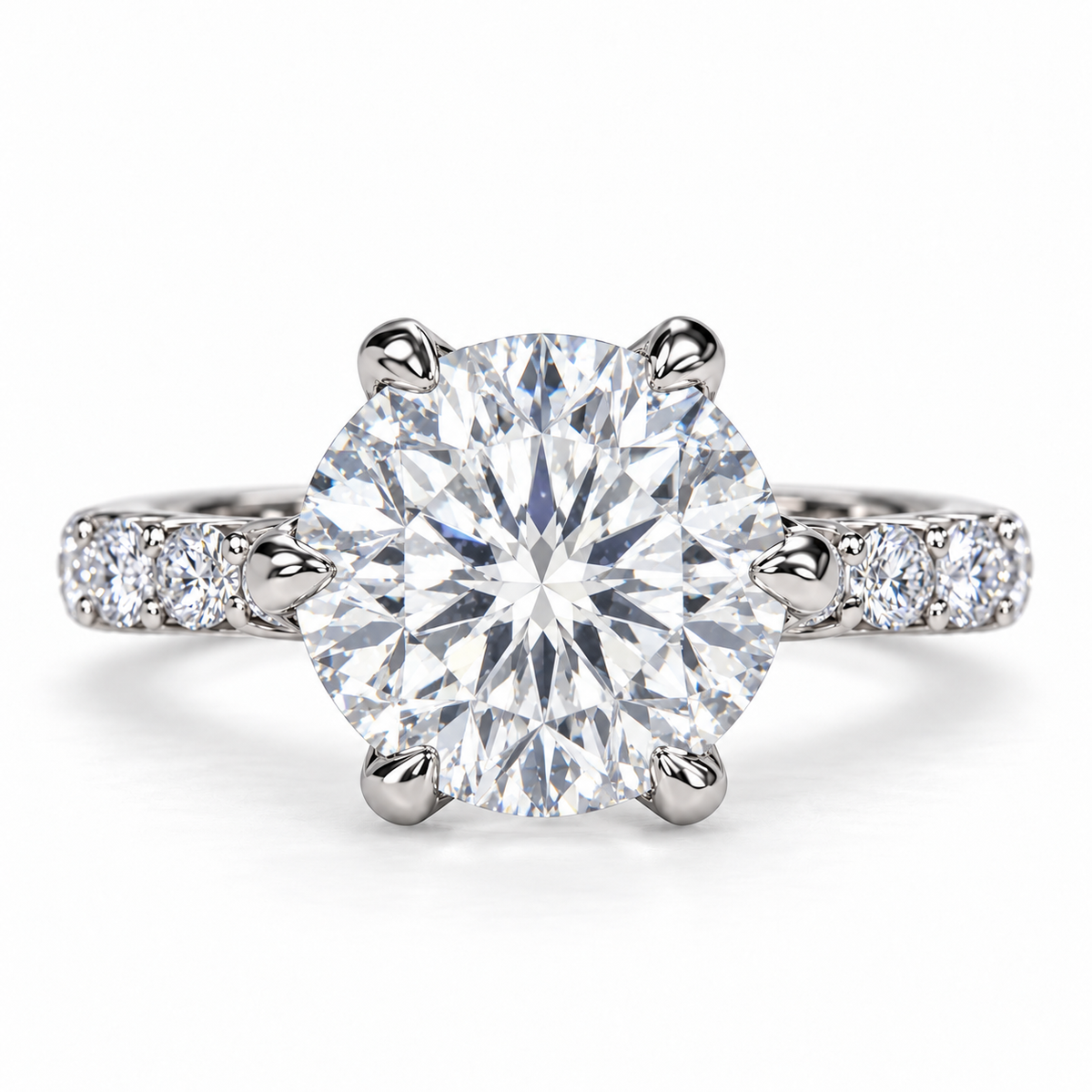 Angled view of the six-petal engagement ring and diamond-set shoulders