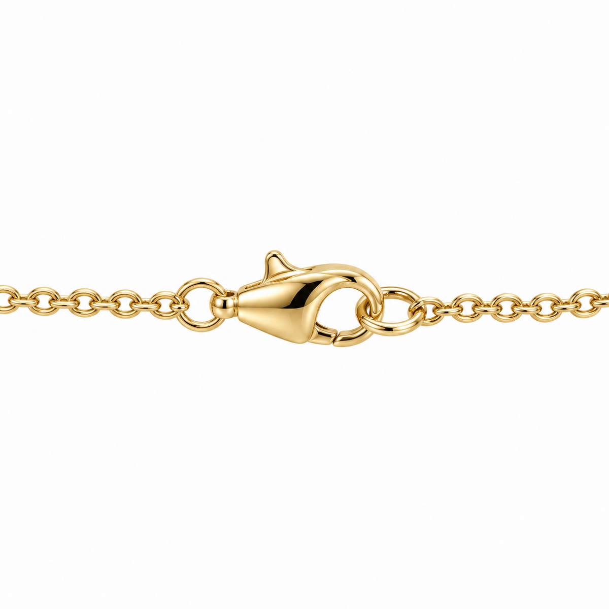 Small yellow gold lobster clasp attached to a fine cable chain
