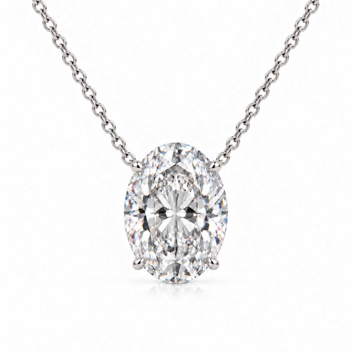 Front view of oval lab-grown diamond solitaire necklace in 14K white gold.