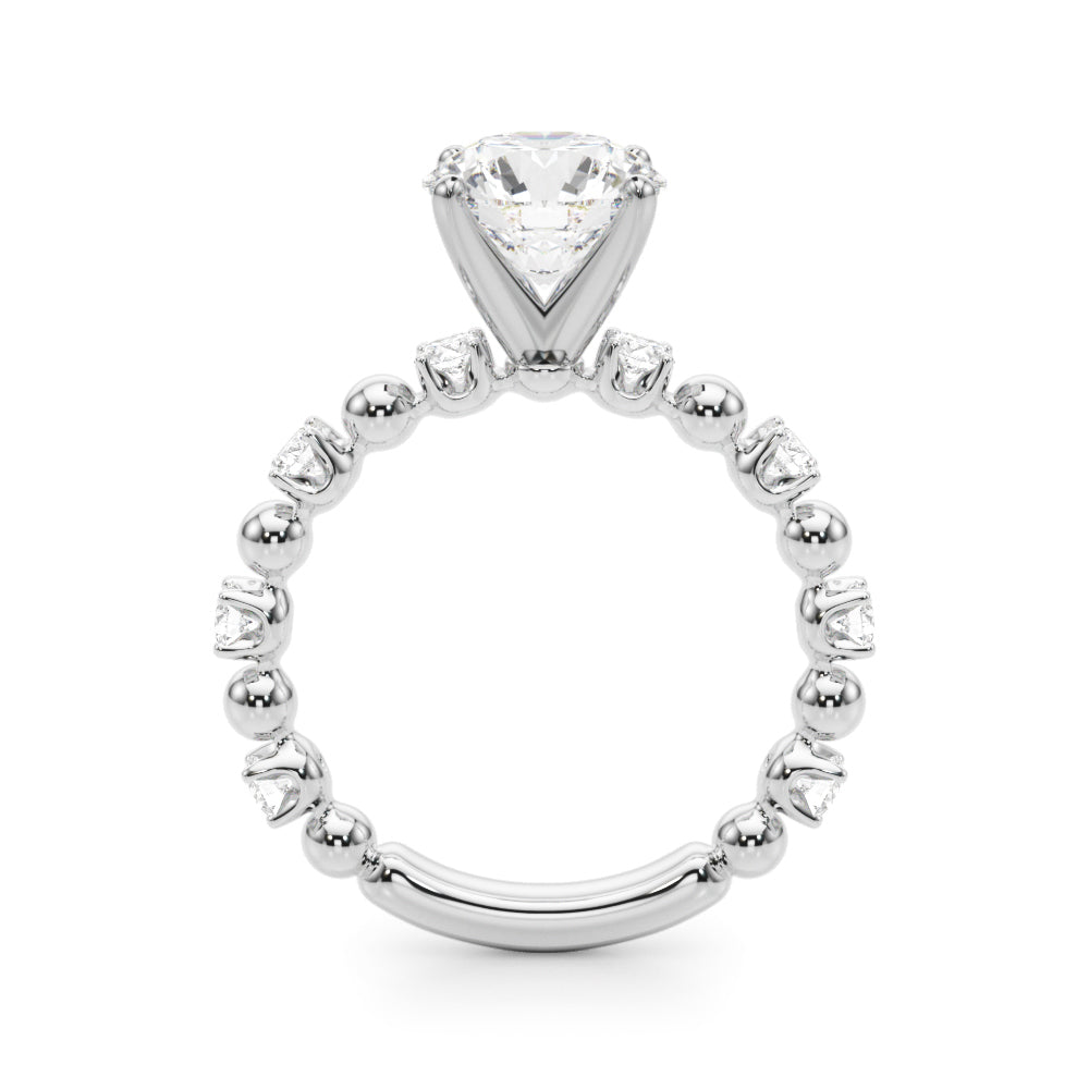 Side profile of the white gold beaded diamond engagement ring showing the raised center setting and polished underside.