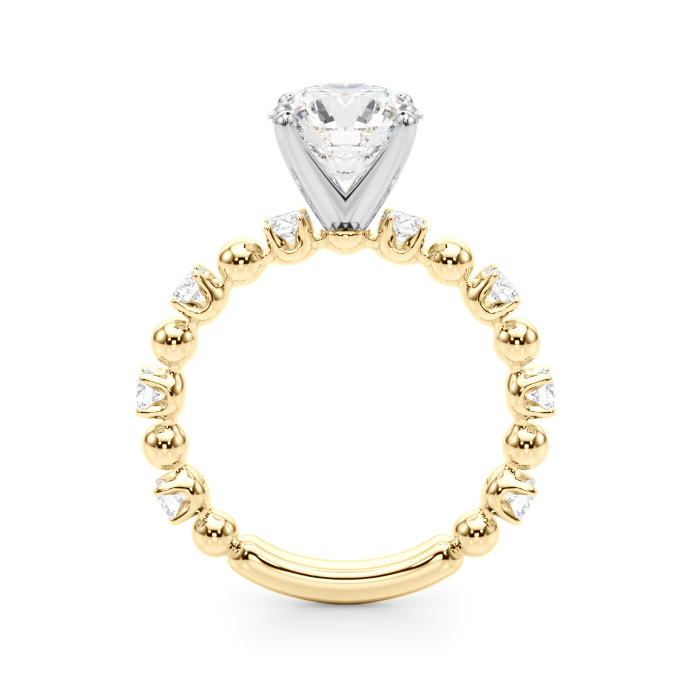 Side profile of the yellow gold engagement ring showing the raised four-prong center and alternating diamonds and gold beads.