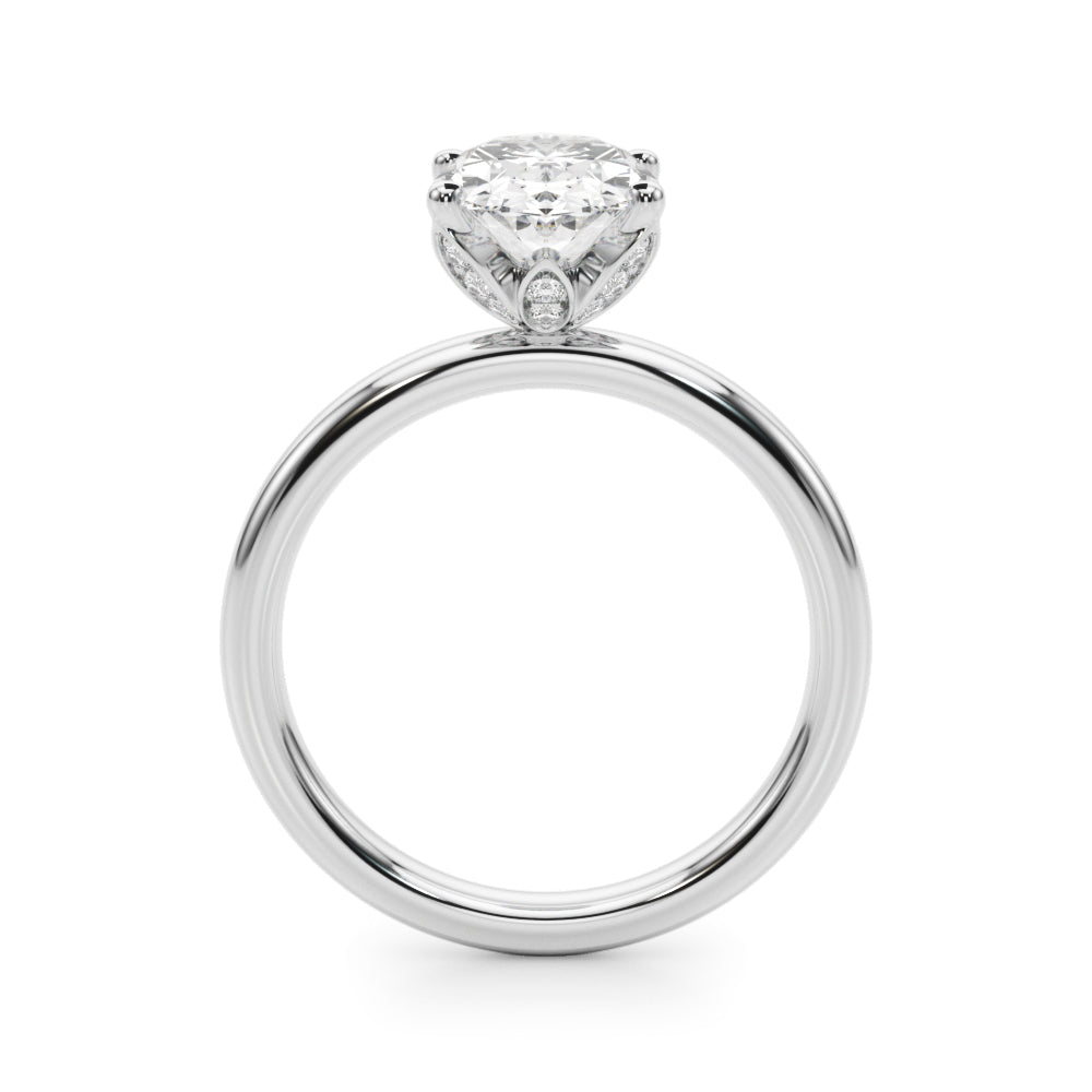 Side profile view of an oval-cut lab-grown diamond engagement ring in 14K white gold, showcasing the hidden halo and diamond-accented basket with a four-prong solitaire setting.