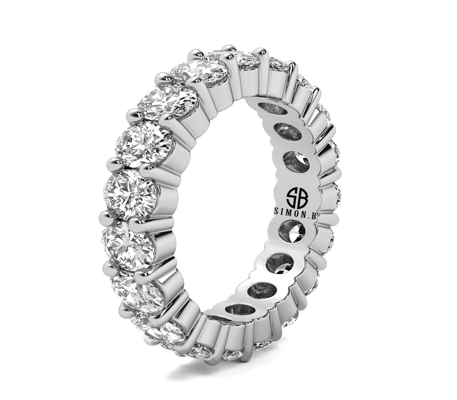 Side view of 14K gold oval diamond eternity ring featuring VS–VVS clarity lab grown stones.