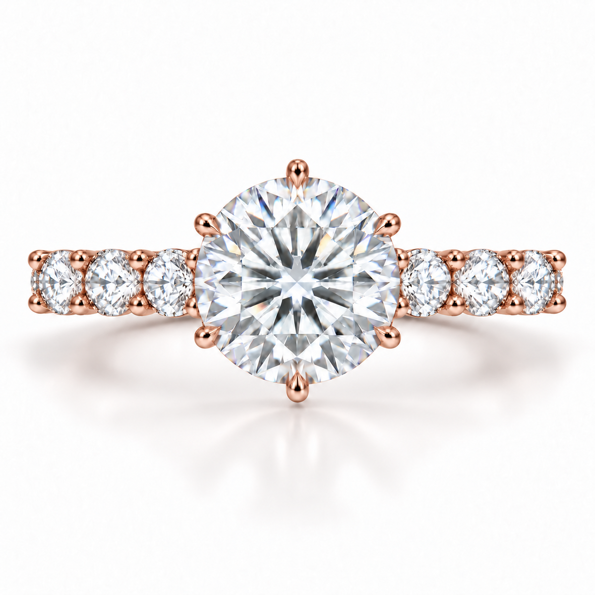 Simon B Jewels round lab-grown diamond engagement ring in 14K rose gold with six prongs and shared-prong diamond shoulders.