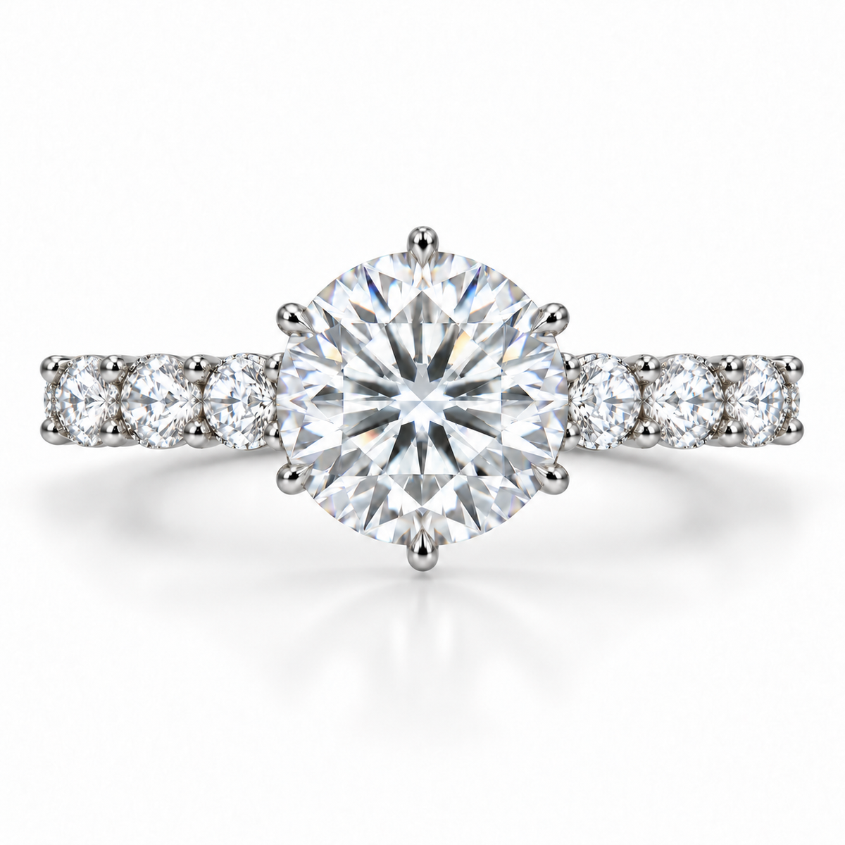 Simon B Jewels round lab-grown diamond engagement ring in 14K white gold with six prongs and shared-prong diamond shoulders.