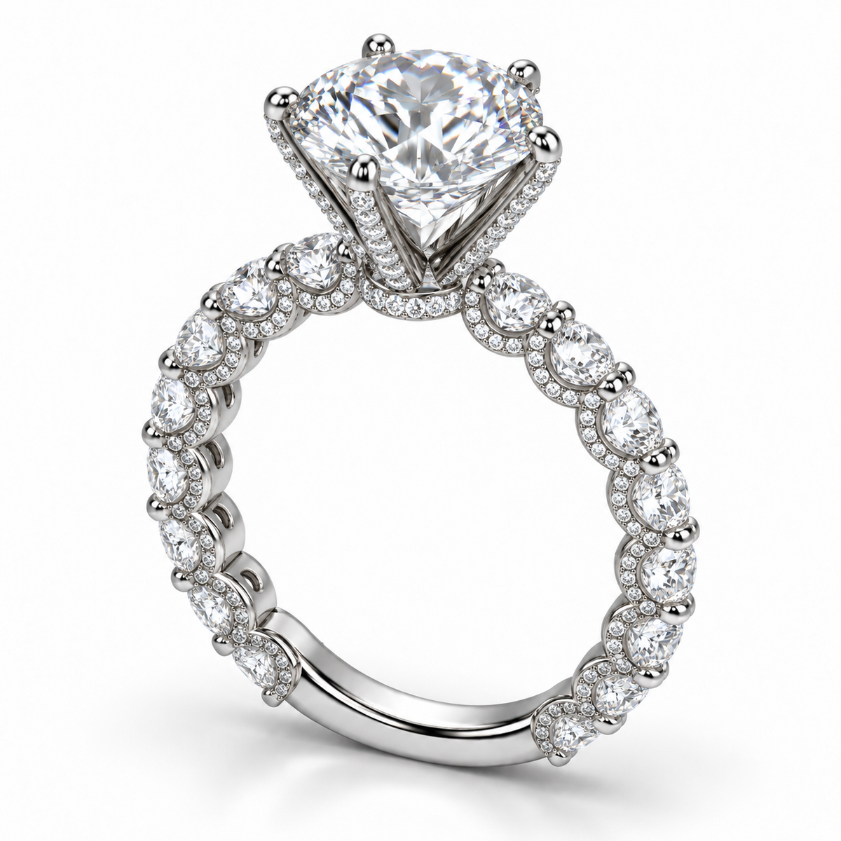 Three-quarter view of Simon B Jewels round diamond engagement ring in 14K white gold, showing micro pavé prongs, U-shaped diamond supports, and the open gallery.