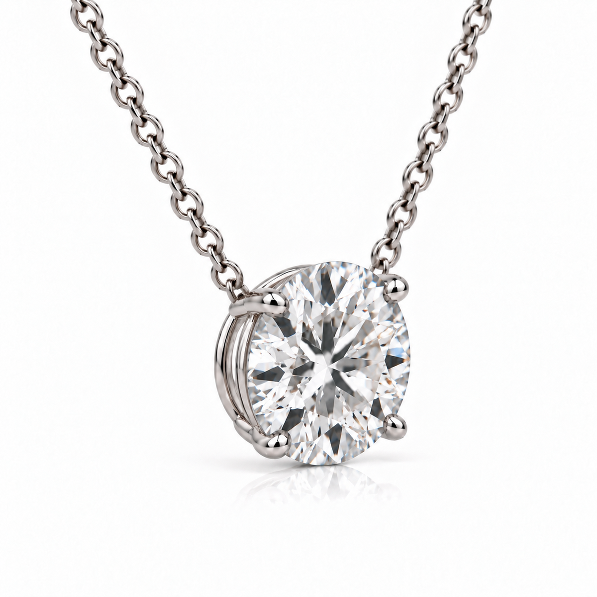Three-quarter view of round diamond solitaire pendant in white gold