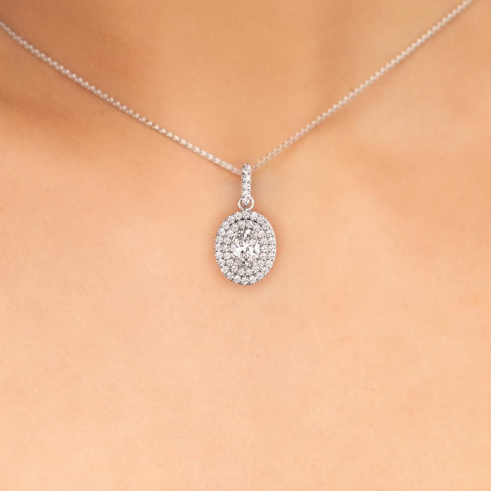 0.80 ct Oval shaped Diamond Double Halo Micropave (0.30ct) setting in 14k gold - simonbjewels.co