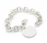 Tiffany & Co. Please Return To Sterling Silver Round Charm Bracelet