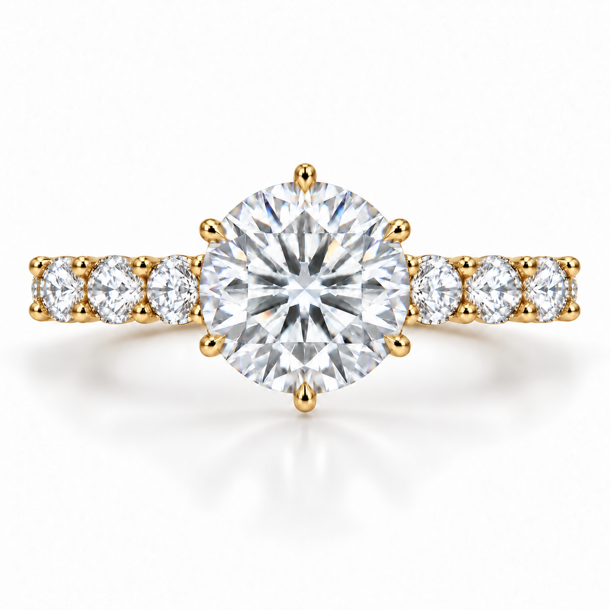     Simon B Jewels round lab-grown diamond engagement ring in 14K yellow gold with six prongs and shared-prong diamond shoulders.
