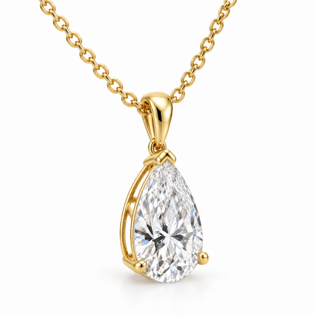 Three-quarter view of pear diamond pendant showing the yellow gold prongs and tapered bail