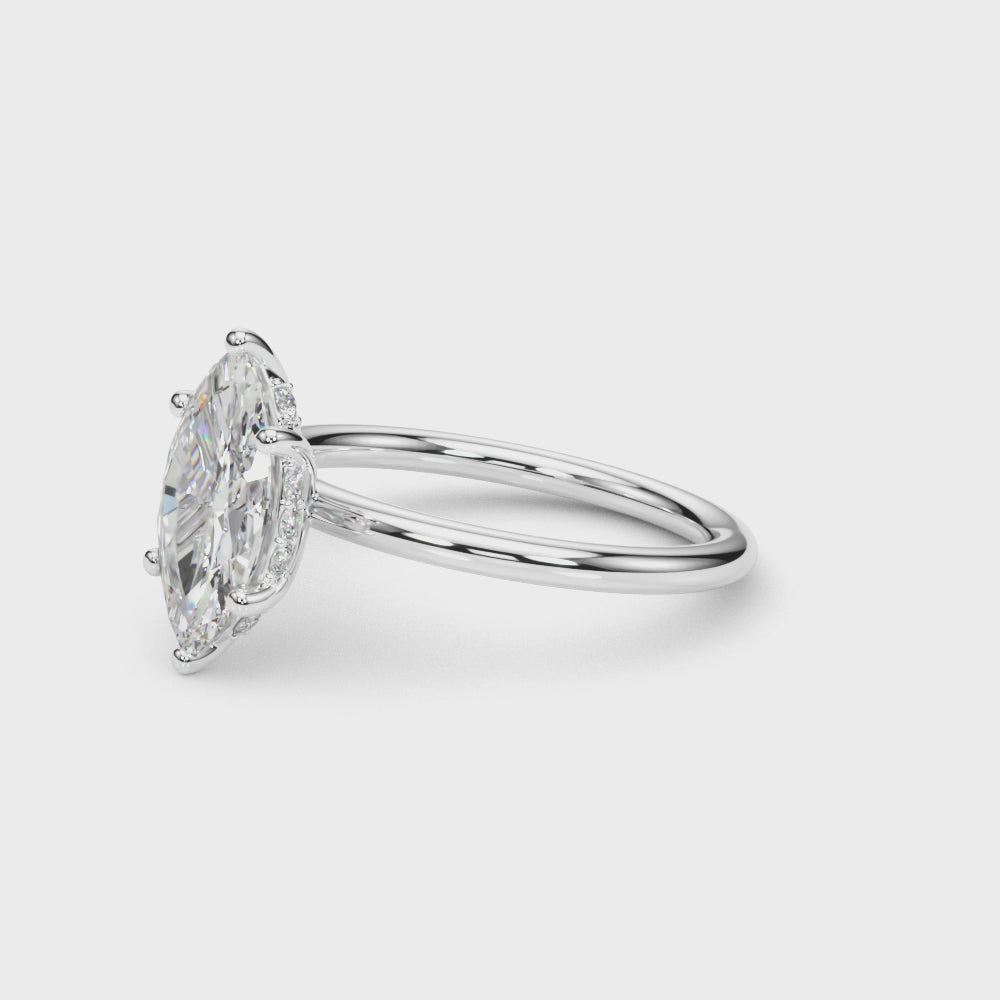 360° view of a marquise cut diamond engagement ring in 14K white gold with hidden halo and six-prong solitaire setting, featuring a 2.20 carat G VS IGI-certified diamond.