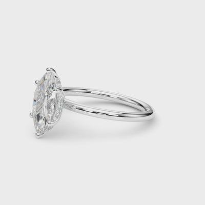 360° view of a marquise cut diamond engagement ring in 14K white gold with hidden halo and six-prong solitaire setting, featuring a 2.20 carat G VS IGI-certified diamond.