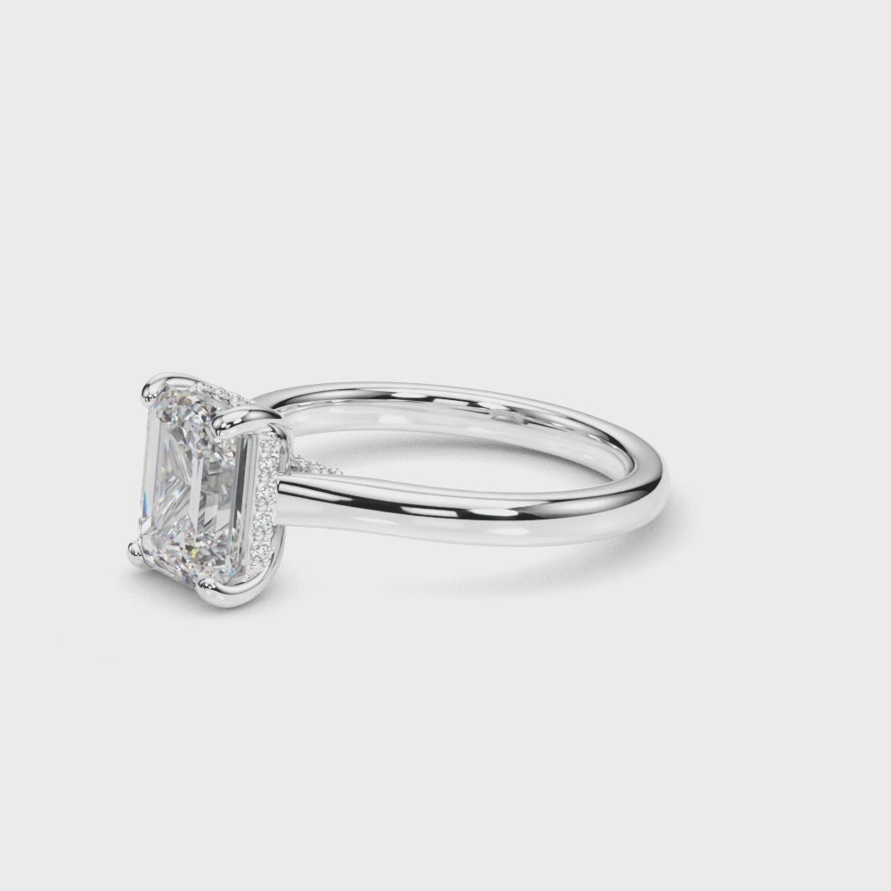 360 degree video of emerald cut lab-grown diamond hidden halo engagement ring