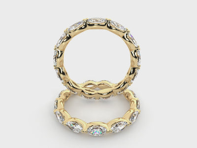 Rotating views of the 14K yellow gold east-west marquise diamond eternity band.