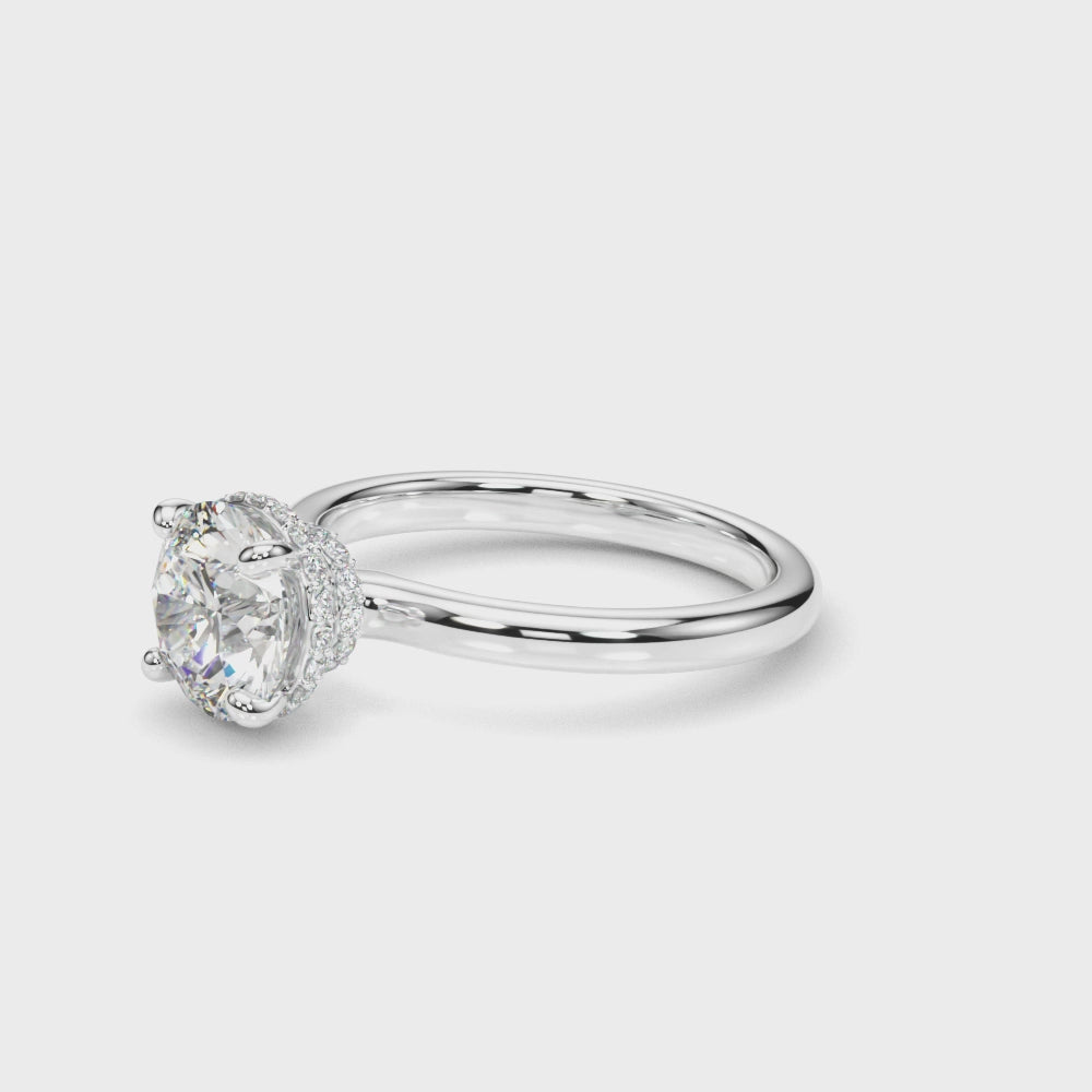 360-degree video of 2.00ct round lab grown diamond engagement ring in 14K white gold, showcasing hidden halo sparkle and polished band detai
