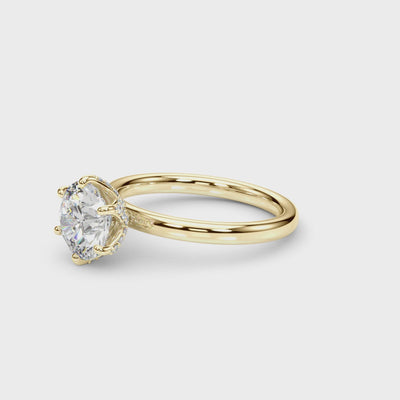 Side view of 6-prong floral diamond engagement ring in yellow gold