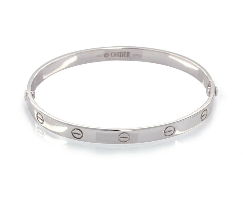 Sold at Auction: Louis Vuitton 18K White Gold (3) Charm Bracelet