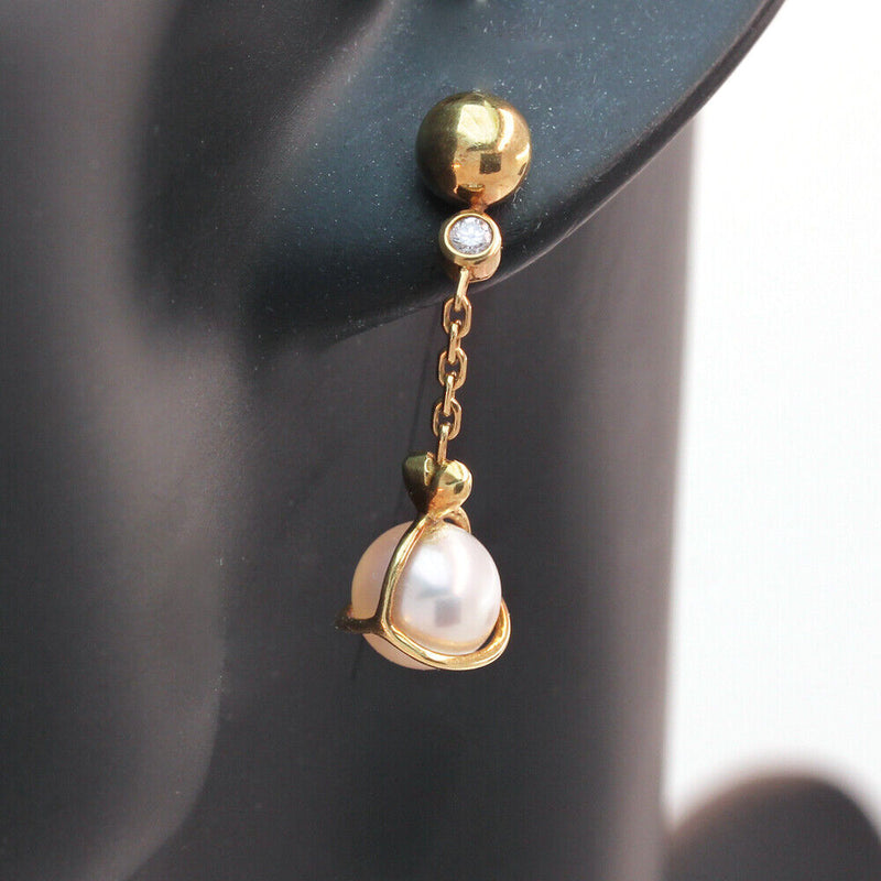 cartier diamond earrings vintage with pearls on a model 18k yellow gold 8mm wide