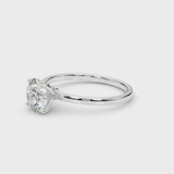 1 1/4 ct tw Round cut Diamond Solitaire 4-Prong Engagement Ring Setting In 18k White Gold