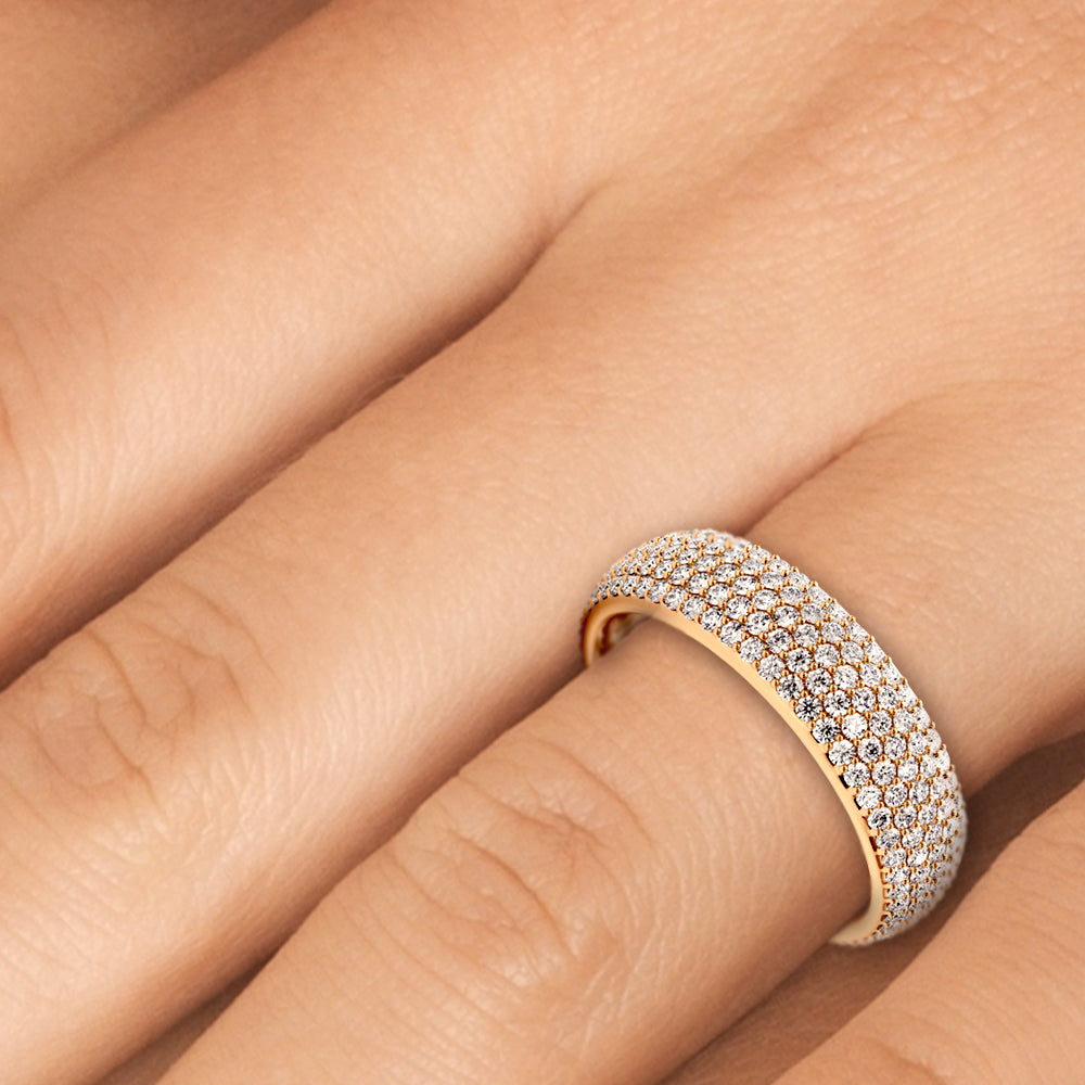 Micro pave diamond wedding band worn on hand