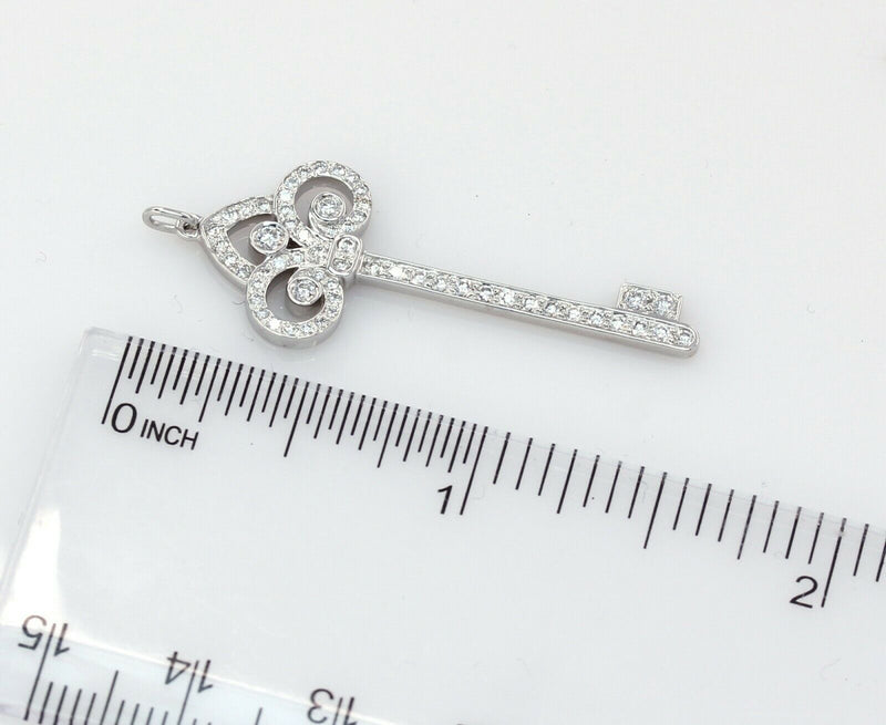 Tiffany & Co. Platinum Fleur De Lis Diamond Key Pendant - simonbjewels.co